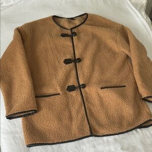 Cozy Caramel Tan Teddy Jacket with Black Trim and Toggle Buttons